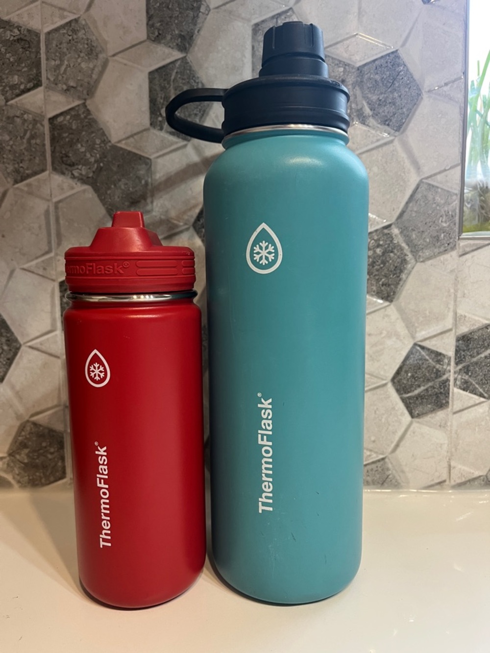 ThermoFlask insulated water bottles - red & teal set